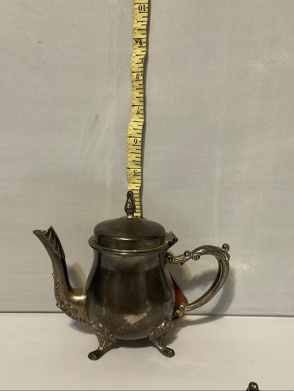 Ornate Silver-Color Tea Pot with Decorative Handle and Spout